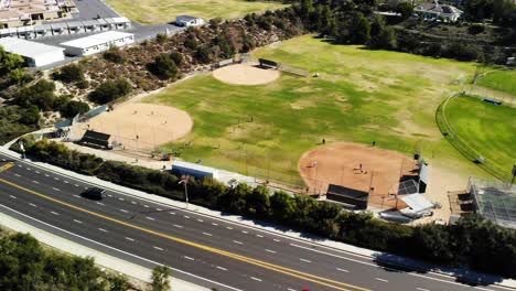 Aerial-panning-shot-of-little-league-baseball-fields-angle-1