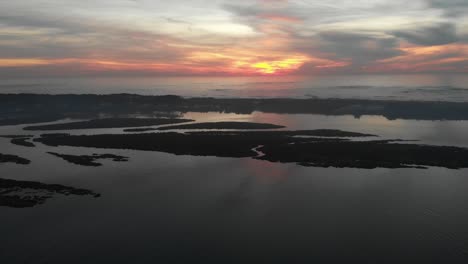 Aerial-shot-of-the-river-at-sunset