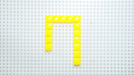 Stop-Motion-Der-Zahl-0,-Die-Jeweils-Ein-Pixel-Erzeugt,-Hergestellt-Mit-Kinderspielzeug