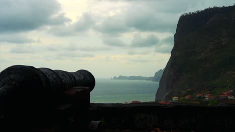 Footage-of-a-canon-pointing-to-the-landscape-on-the-horizon