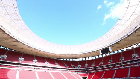 Low-angle-shot-panning-across-the-upper-interior-open-roof-of-the-Mane-Garrincha-Stadium