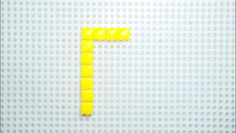 Stoppen-Sie-Die-Bewegung-Des-Buchstabens-P,-Wodurch-Jeweils-Ein-Pixel-Entsteht,-Hergestellt-Mit-Kinderspielzeug