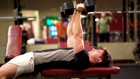 Closeup-side-shot-of-teen-bodybuilder-doing-lying-triceps-pullover-or-presses