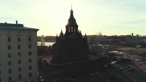 Aerial-shot-of-a-church-in-Helsinki-during-sunset