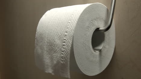Unrolling-Of-Toilet-Paper.-Close-up-shot