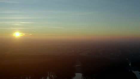 Aerial-sunset-shot-over-Munich-city,-Germany