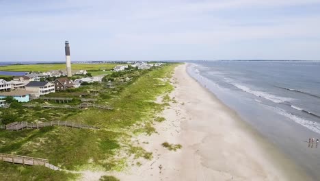 Oak-Island-lighthouse-on-a-bright-sunny-day-with-empty-beach