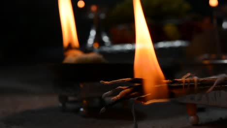 Closeup-of-burning-pooja-Aarti-sticks-in-the-temple-during-a-navaratri-festival