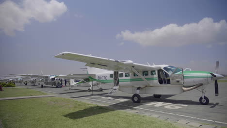 Small-taxi-airplanes-parked-at-Arusha-airport,-Tanzania
