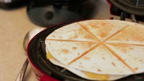1080p-Wide-pan-from-right-to-left-of-quesadilla-cooking