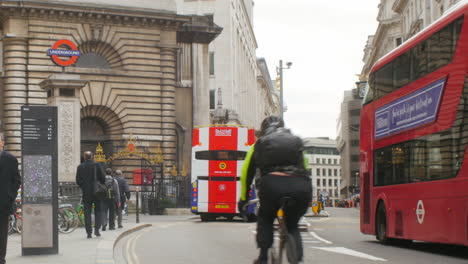 London-financial-centre-with-double-decker-bus-passing