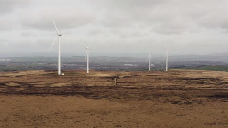 Aerial-footage-of-wind-turbines-in-a-field