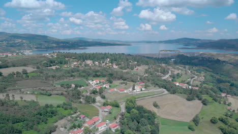 Aerial-view-of-Barragem-do-Alto-Rrabagão-and-the-villages-around-in-the-north-of-Portugal