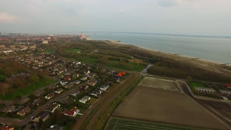 Aerial:-The-city-of-Vlissingen-located-at-the-North-sea-during-sunset