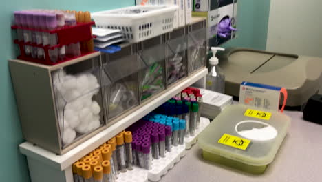 Colorful-blood-collection-tubes-sitting-at-a-blood-testing-clinic