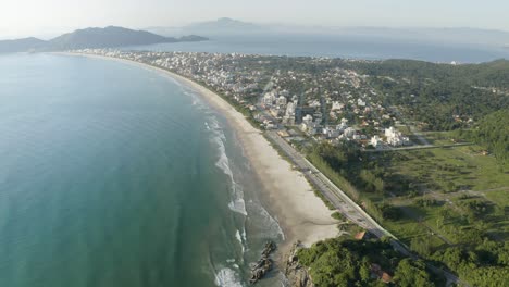 Drone-flying-high-over-a-beach-in-Bombinhas---Brazil