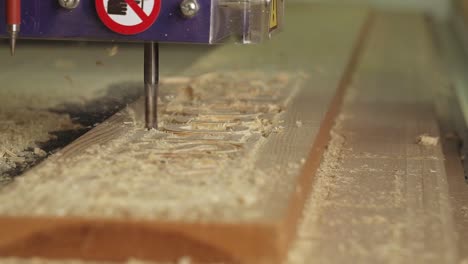Wood-Chippings-flying-from-an-Industrial-cutting-machine-in-Slow-Motion