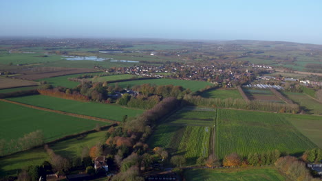 Wide-aerial-view-of-the-small-rural-village-of-Wye,-Located-near-Ashford,-Kent,-UK