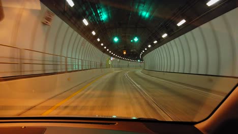 Car-drives-in-underrground-Tunnel