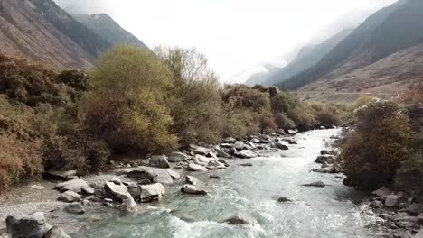 Amazing-mountain-river-flowing-through-Barskoon-Valley-in-Kyrgyzstan-Central-Asia