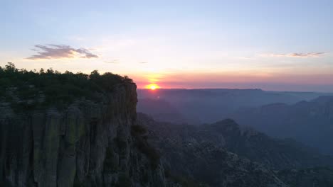 Aerial-shot-of-the-sunrise-at-Divisadero,-Copper-Canyon-Region,-Chihuahua