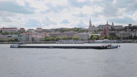 Follower-footage-from-a-moving-barge-on-Danube-river-in-Budapest