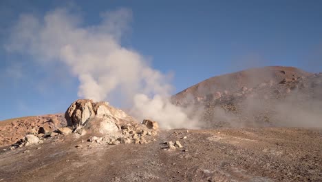 El-Tatio-geysers-steaming-at-sunrise-in-the-Atacama-desert-in-Chile,-South-America