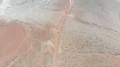 Vehicle-on-a-desert-dirt-road