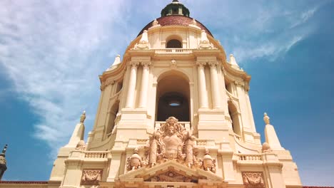 Low-Angle-Shot,-Front-facade,-entrance-and-dome,-of-Pasadena-City-Hall-Building,-day-sunlight,-shot-from-a-low-angle-with-camera-moving-slowly-towards-building,-Pasadena,-California