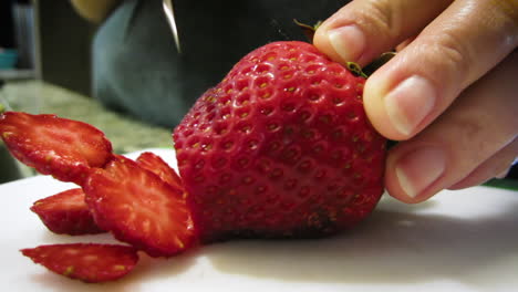 Close-up-of-the-slicing-of-a-strawberry
