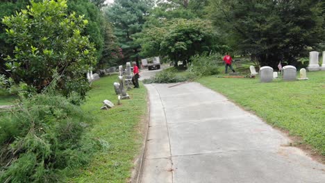 Volunteers-of-United-Way-of-Lancaster-County-cutting-off-branches-and-clearing-shrubs-at-the-Woodward-Hill-Cemetery