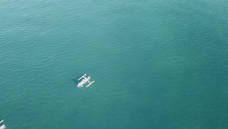 fly-straight-over-the-group-of-traditional-white-fishing-boats-via-drone-in-Bali-4K-and-30-fps