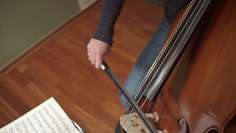 Footage-Of-A-Musician-Playing-A-Double-Bass-With-A-Bow