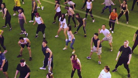 Top-View-of-People-Dancing-on-a-Soccer-Field