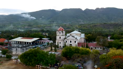 wide-Aerial-of-Filipino-Catholic-Church-in-Oslob,-Our-Lady-of-Immaculate-Conception-Church