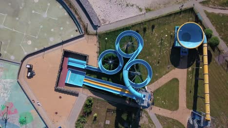 Aerial-overhead-shot-of-toboggans-of-a-water-park-without-water