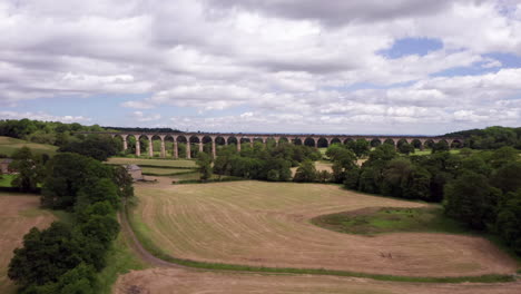 Rising-Dolly-Shot-Revealing-Crimple-Valley-Viaduct-in-North-Yorkshire-on-a-Summerâ€™s-Day