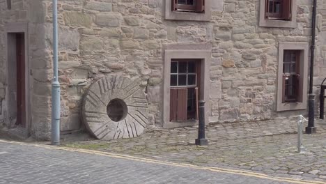 Slow-motion-of-a-15th-century-watermill-in-the-city-centre