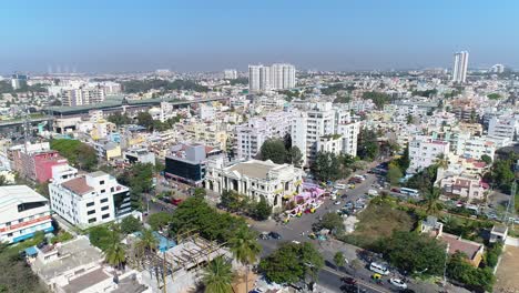 Aerial-circle-pan-of-Chikmagalur-downtown-on-a-sunny-day