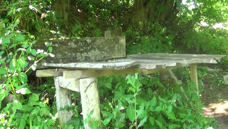 Abandoned-concrete-table-with-bench-in-mountain