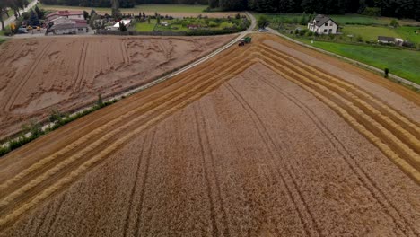 Aerial-shooting-on-gold-field-in-agriculture-environment,-harvest-time-on-europe,-nice-shape-gorund