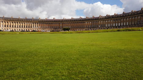Hyperlapse-of-The-Royal-Crescent-in-Bath,-Somerset-on-a-Sunny-Summer’s-Day-with-Blue-Sky-and-White-Clouds-moving-from-Left-to-Right
