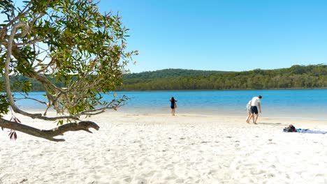 tourists-on-Brown-lake,-eucalyptus-lake,-north-stradbroke-island,-queensland,-Australia