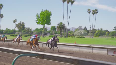 Horses-racing-down-the-final-stretch-that-changes-to-slow-motion-as-they-near-and-cross-the-finish-line