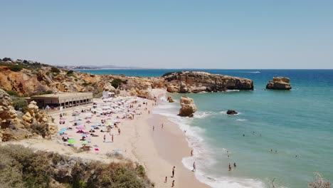 Overlooking-Albufeira-Beach-and-cliffs-on-beautiful-summer-day,-Portugal,-wide