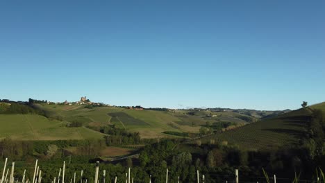 The-clip-start-with-grass-covering-the-entire-lens-and-slowly-reveal-the-beautiful-hills-landscape-of-Langhe-in-Piedmont-Italy