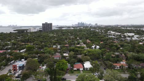 Aerial-of-suburban-Miami-with-downtown-Miami,-Florida-visible-in-the-distane