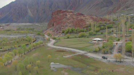 Parked-SUV-On-Rural-Road-In-Ghizer-Valley