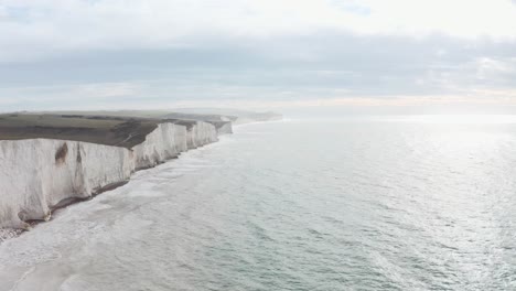 Drone-shot-along-beautiful-white-chalk-cliffs-South-England