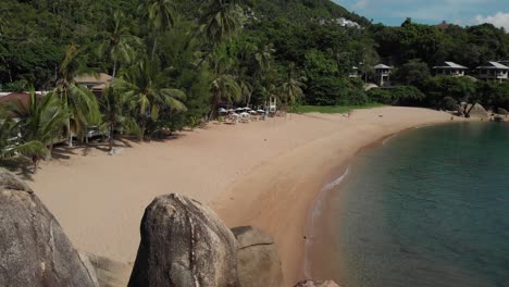Beach-Resort-on-Koh-Tao-with-Beautiful-Rocks-and-White-Sand-Beach-and-Palm-Trees